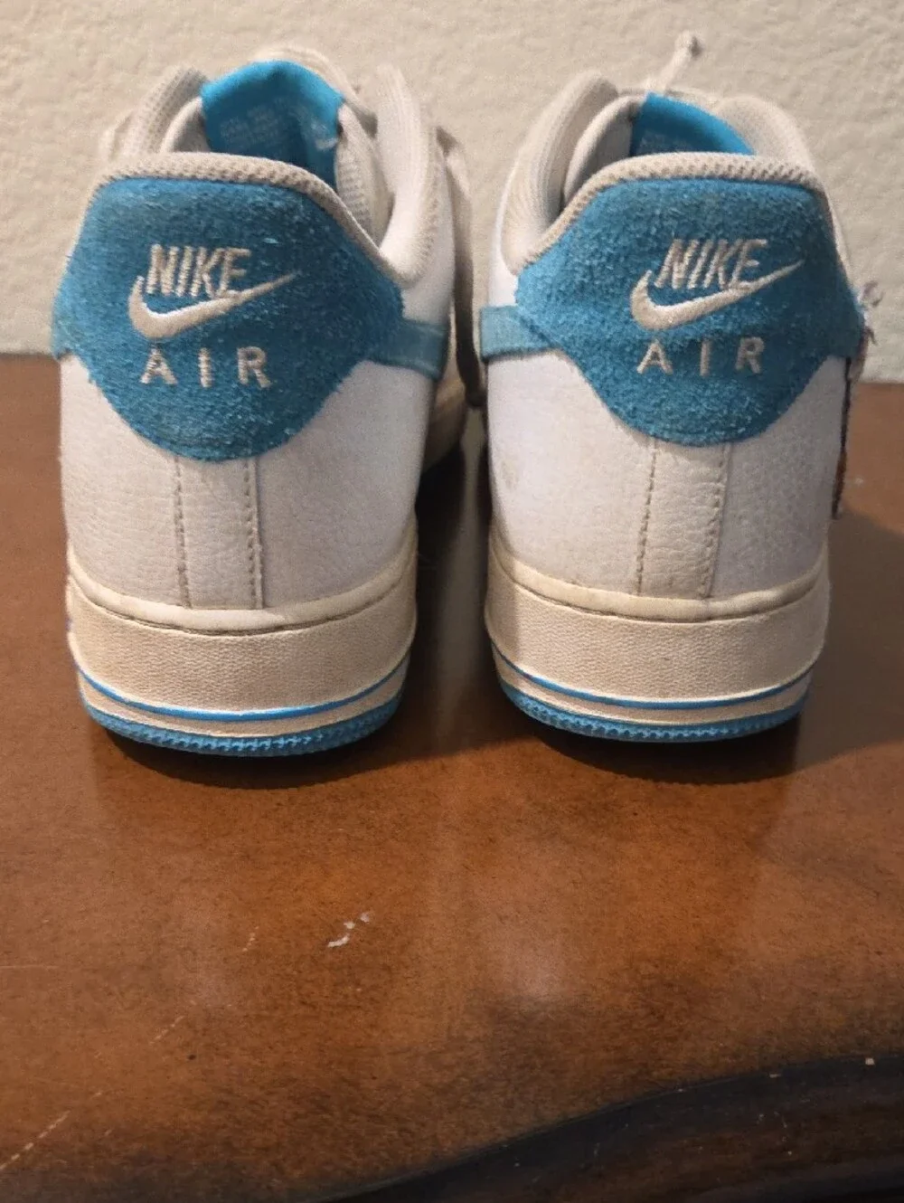 Nike AIR FORCE 1 White and Light Blue Low-Top Sneakers with Cartoon Graphic